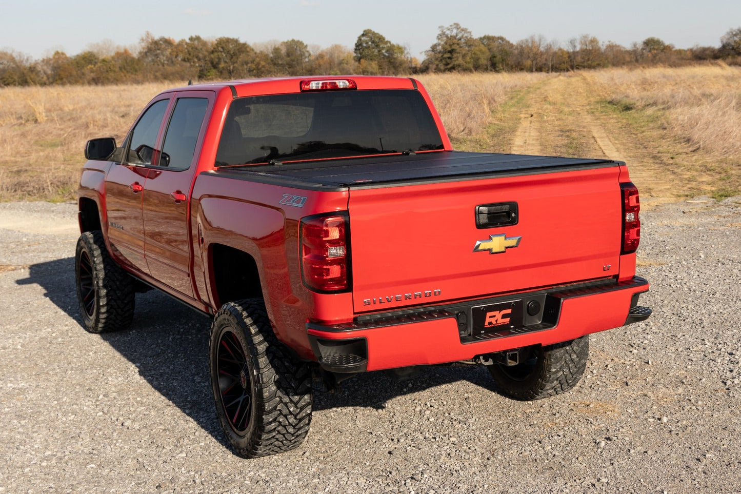 Rough Country (49119651) Hard Tri-Fold Flip Up Bed Cover | 6'7" Bed | Rail Cap | Chevy/GMC 1500/2500HD/3500HD (14-19)